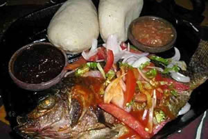 Banku and Tilapia, a local delicacy.